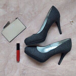 Black pumps with silver accents